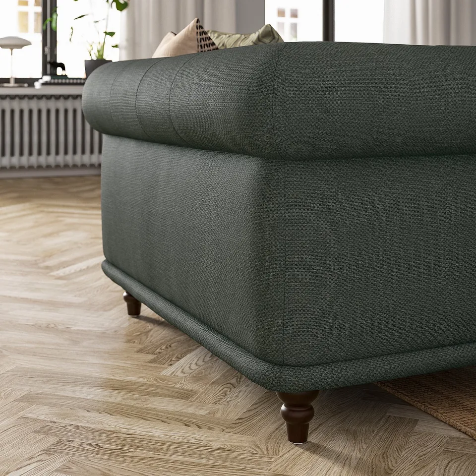 Dark grey VISKAFORS sofa, classic design, rounded edges, wooden legs.