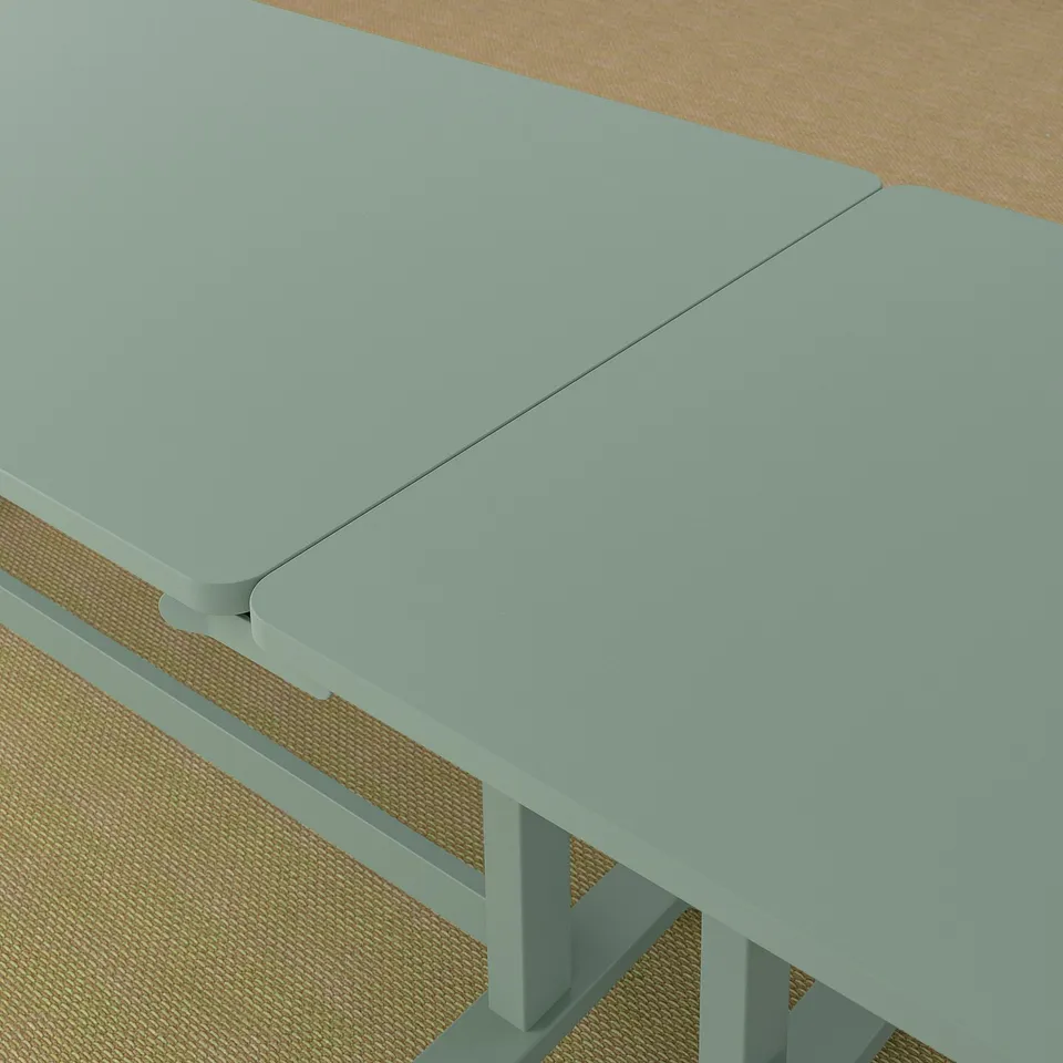 Foldable meeting table with castors for easy movement and storage. Ideal for flexible workspaces.