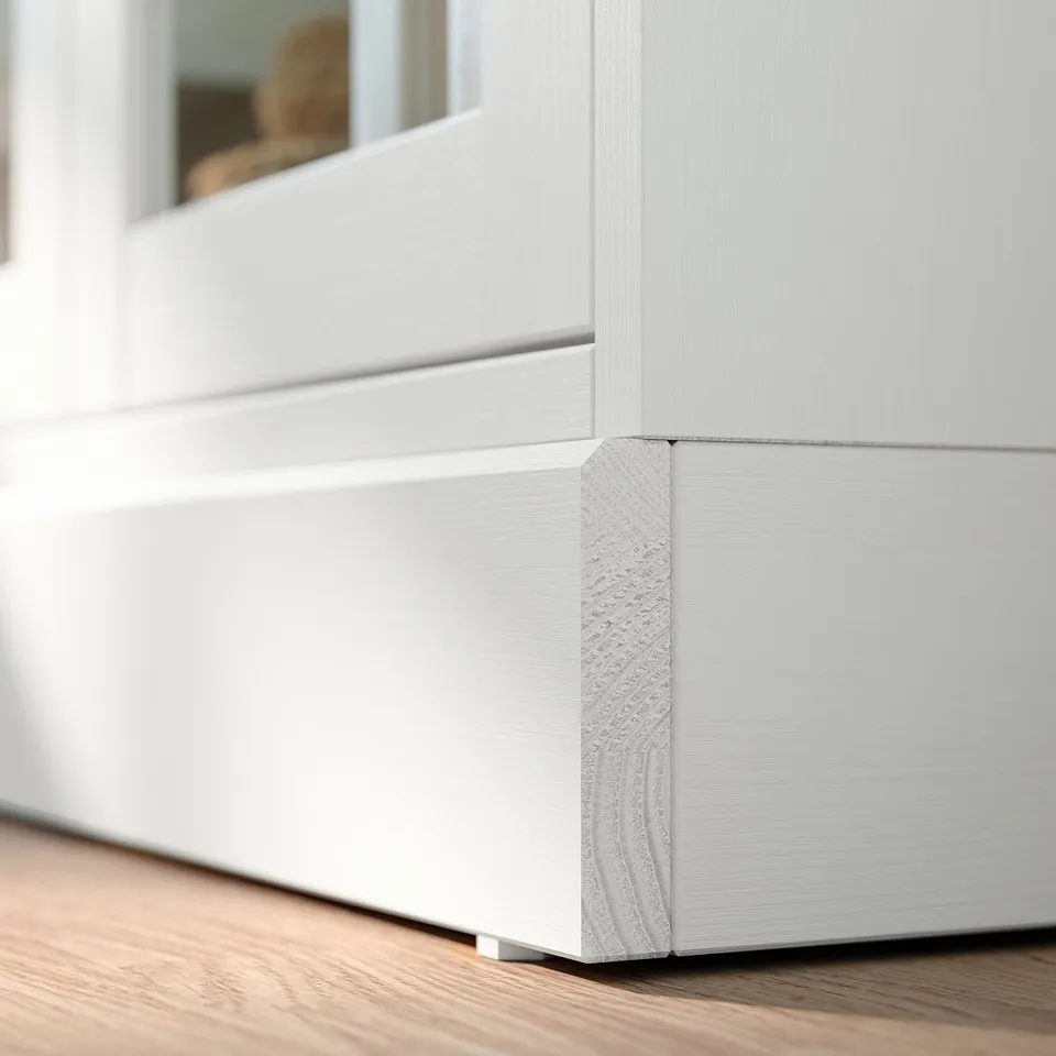 White HAVSTA cabinet corner, brushed pine, soft-close doors, glass.