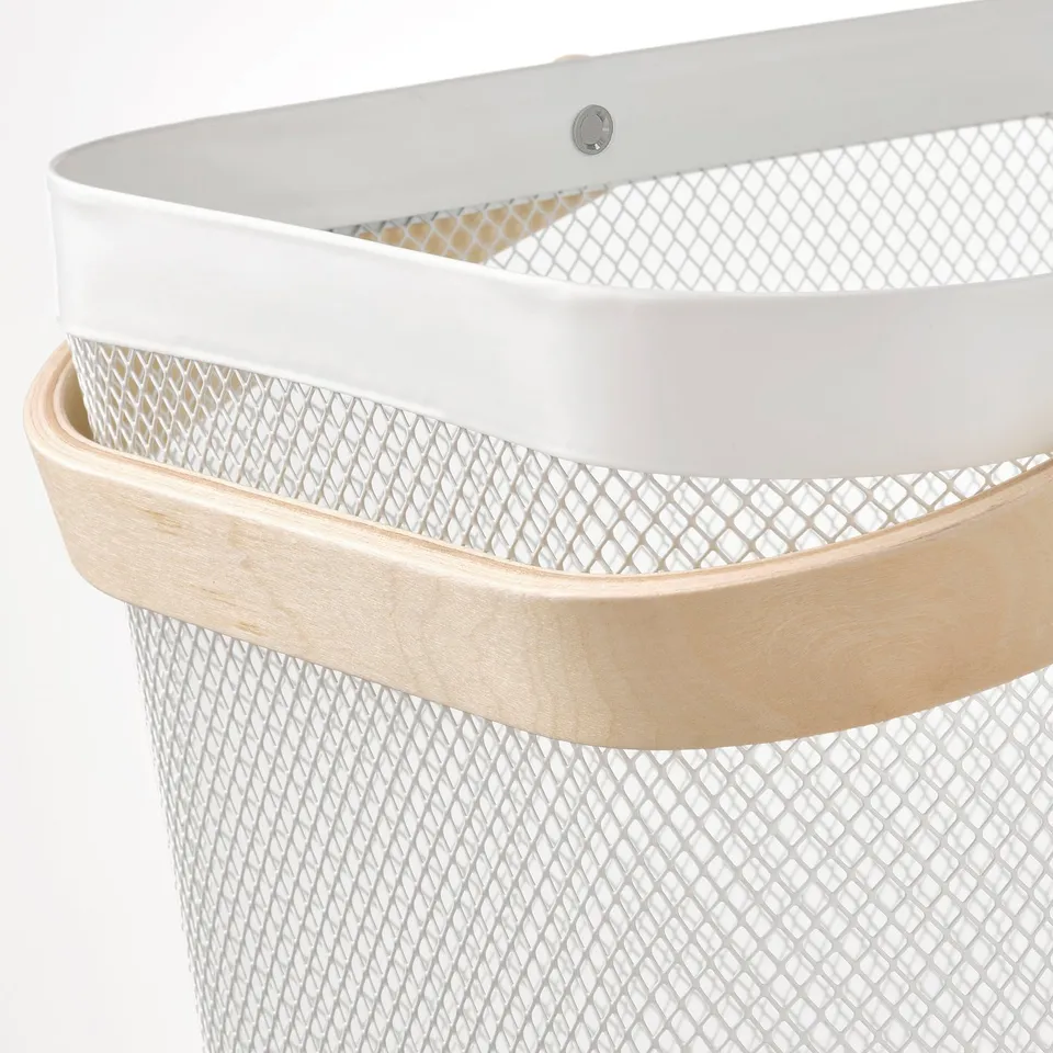 Metal wire basket with wooden handle, modern design.