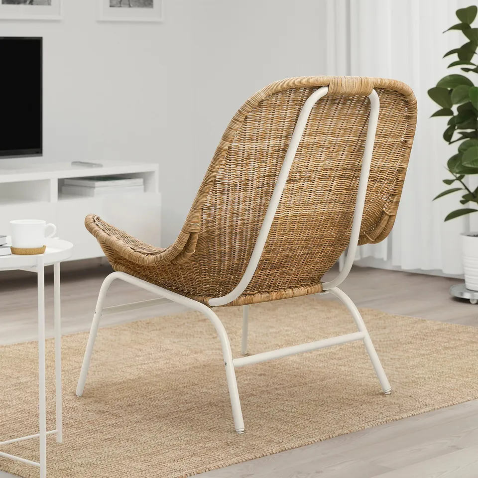 Wicker chair FRYKSÅS in beige, white frame, sleek & minimalist. Large, comfy, fits well in modern room.
