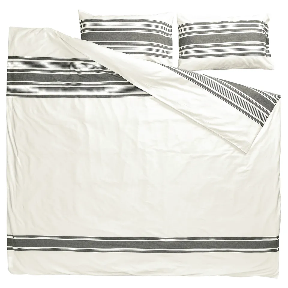 A JÄTTEFRÄKEN bedding set in white with grey stripes. The set includes a duvet cover and two pillowcases made from recycled cotton.