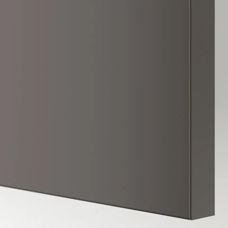 Sleek, modern sliding door with smooth, semi-matte finish in sophisticated grey, reflecting light subtly.