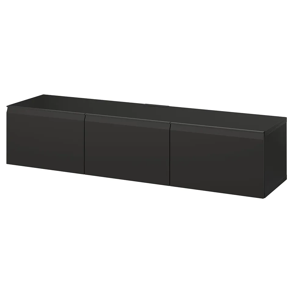A BESTÅ black tv bench with sleek design, smooth surfaces, and 3 storage compartments.