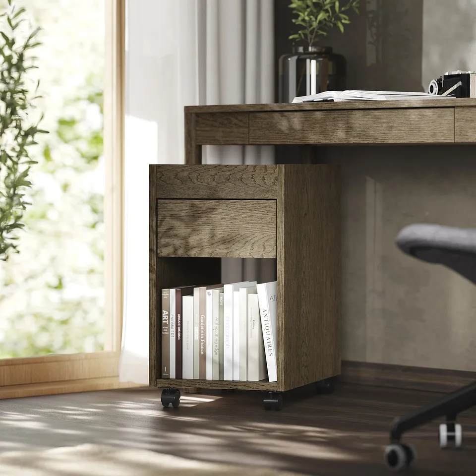 Home office with TONSTAD brown wooden storage. Books under cabinet; potted plant, desk, window.
