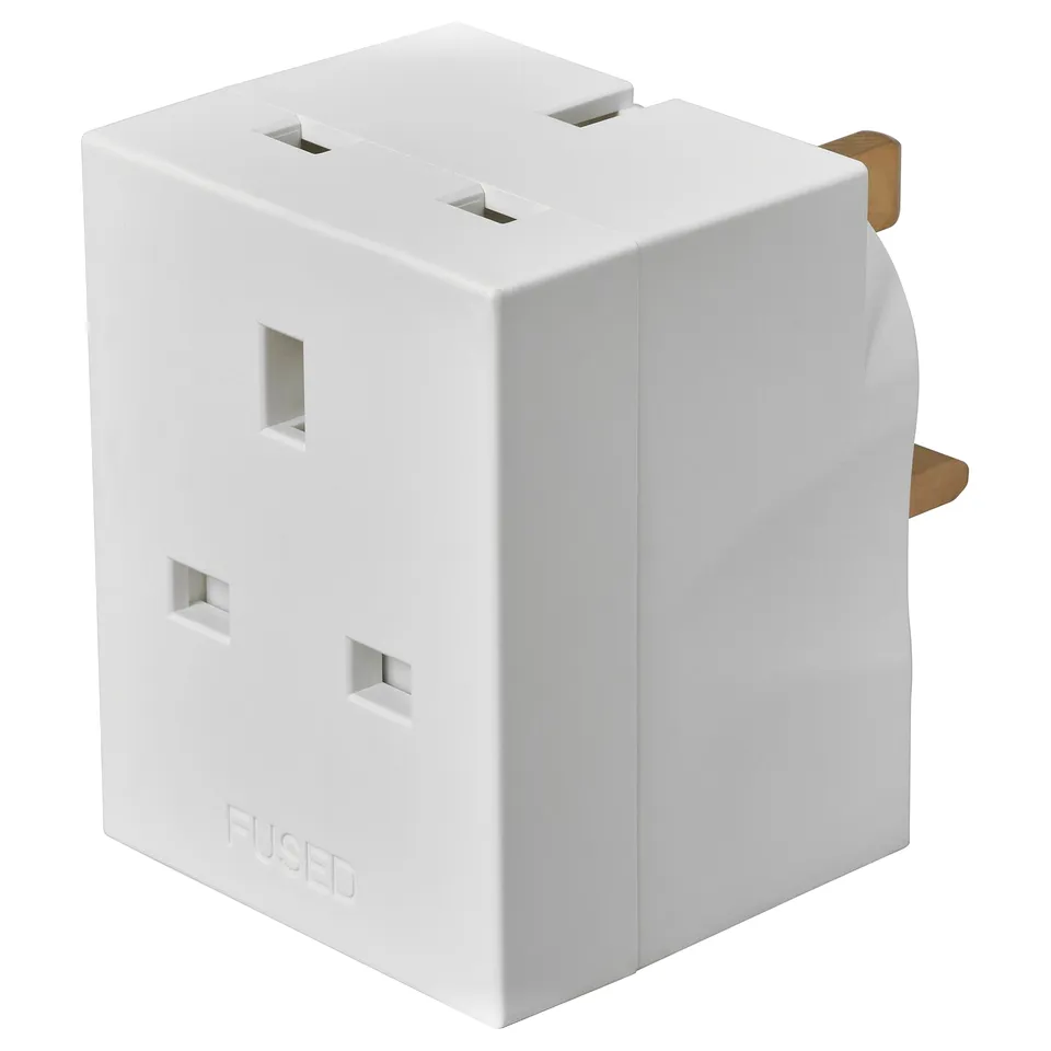 A KOPPLA white, cube-shaped 3-way adapter with slots on multiple sides for charging three devices simultaneously. Made of durable abs plastic.
