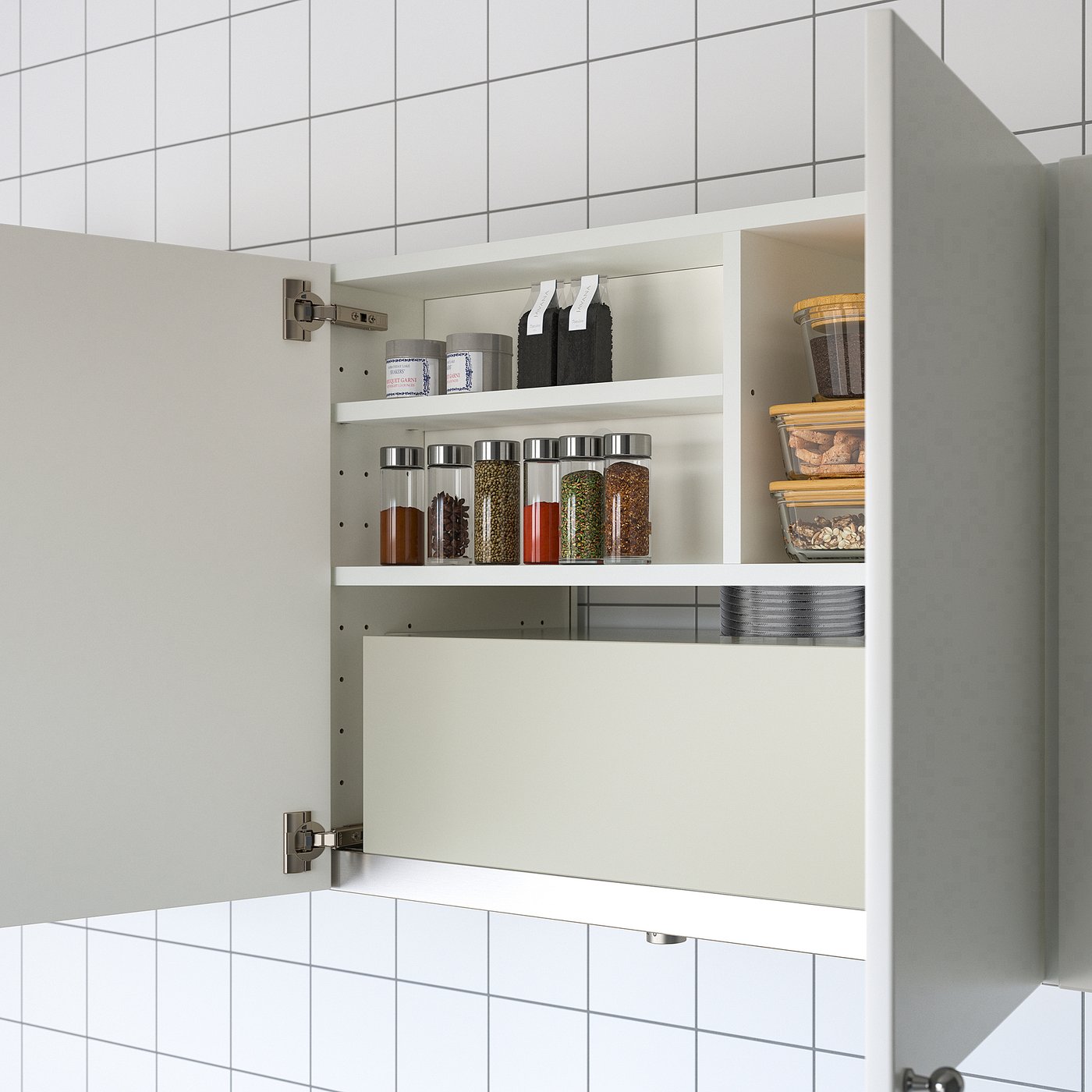 Open wall cabinet with organised spices and containers, fixed to tiled wall.