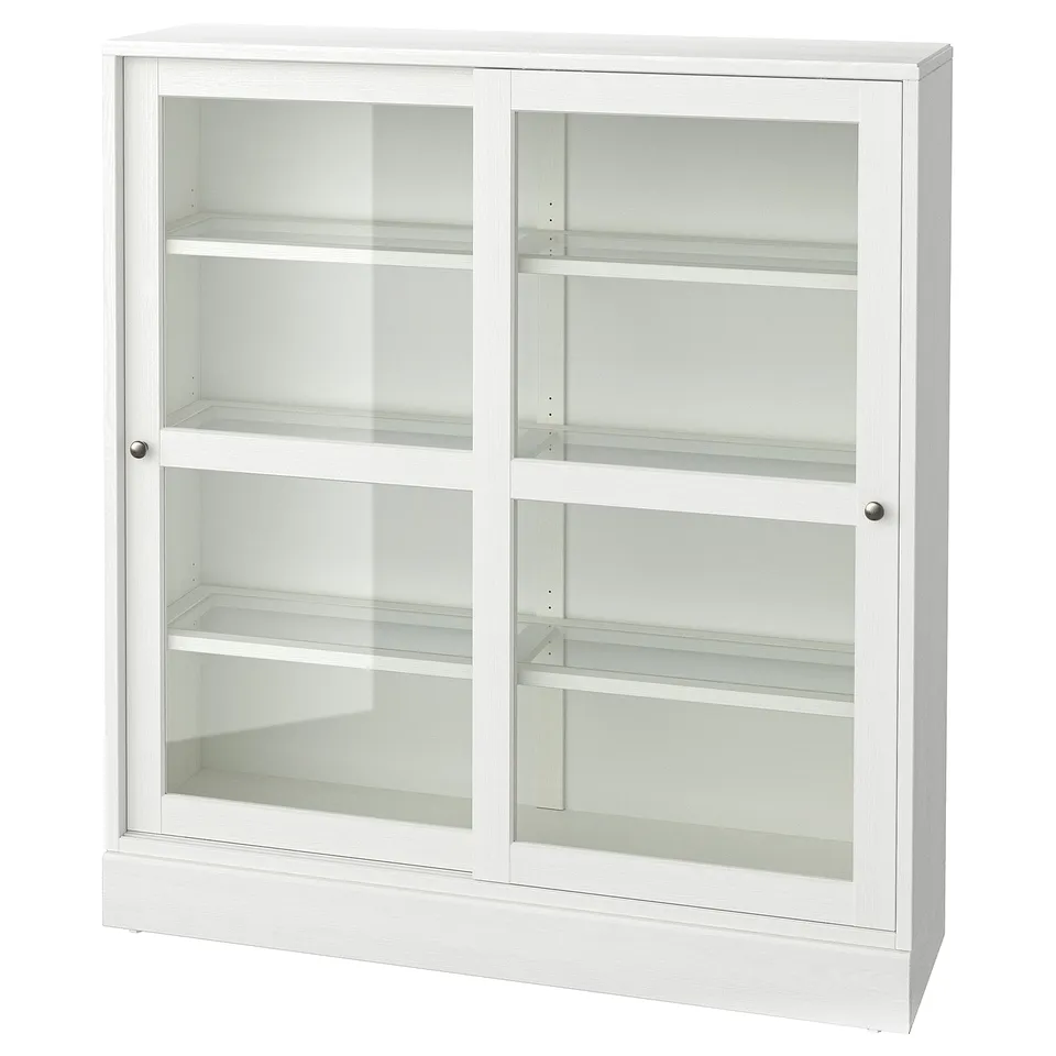 HAVSTA white wooden cabinet, sliding glass doors, three shelves.