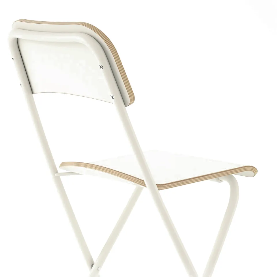 Modern white foldable chair with curved seat and back, metal frame, ideal for spaces with limited storage.