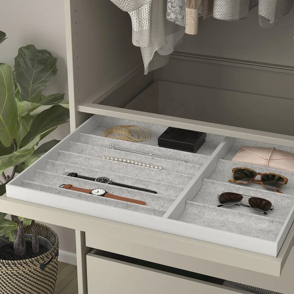Grey tray drawer organises jewellery and accessories with smooth pull-out.