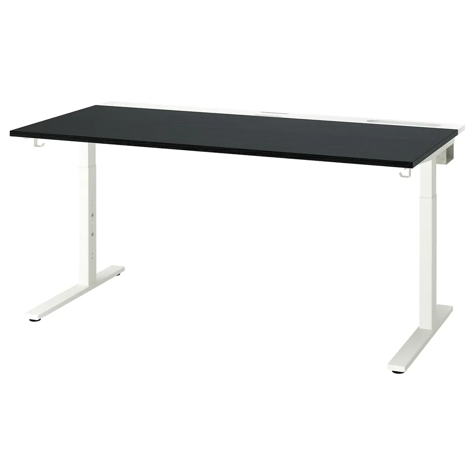 Black desk, white legs, minimalist.