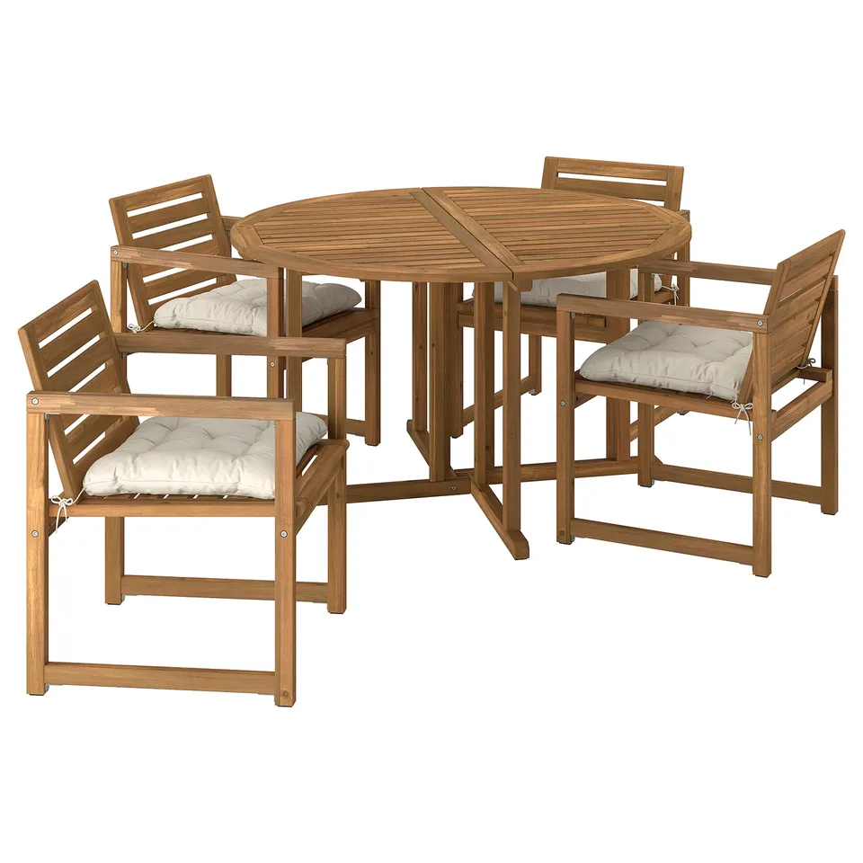 NÄMMARÖ outdoor patio set, light brown acacia wood, round table, six armchairs with beige cushions.