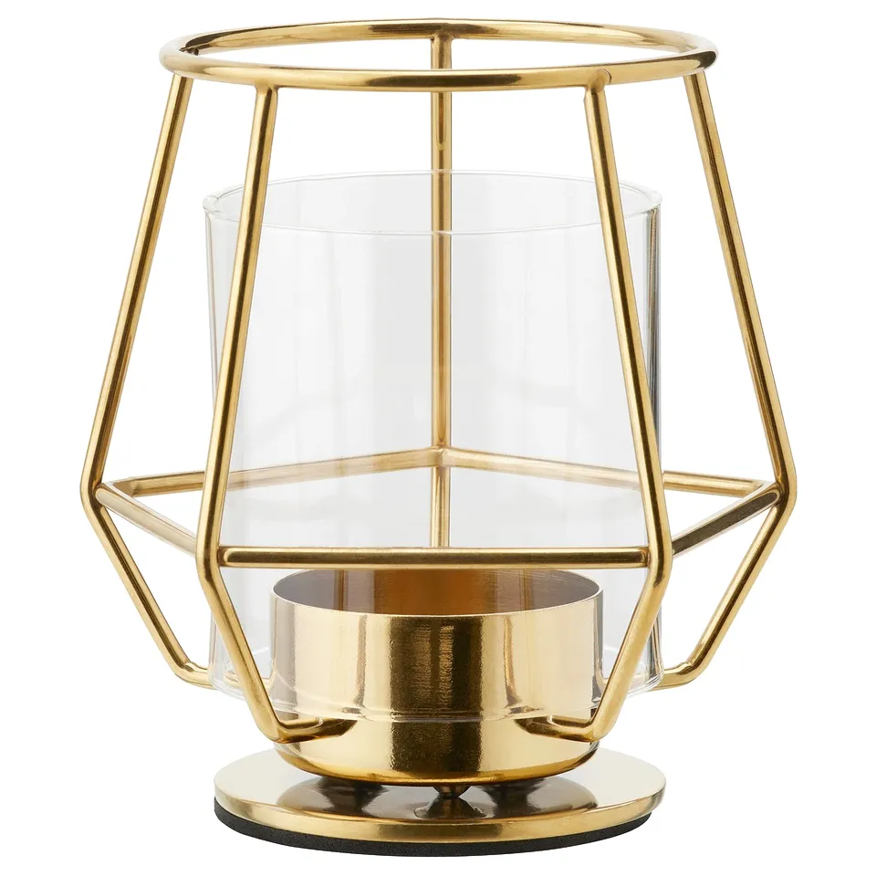 Modern golden lantern; clear glass; geometric design; eva base; stainless steel.