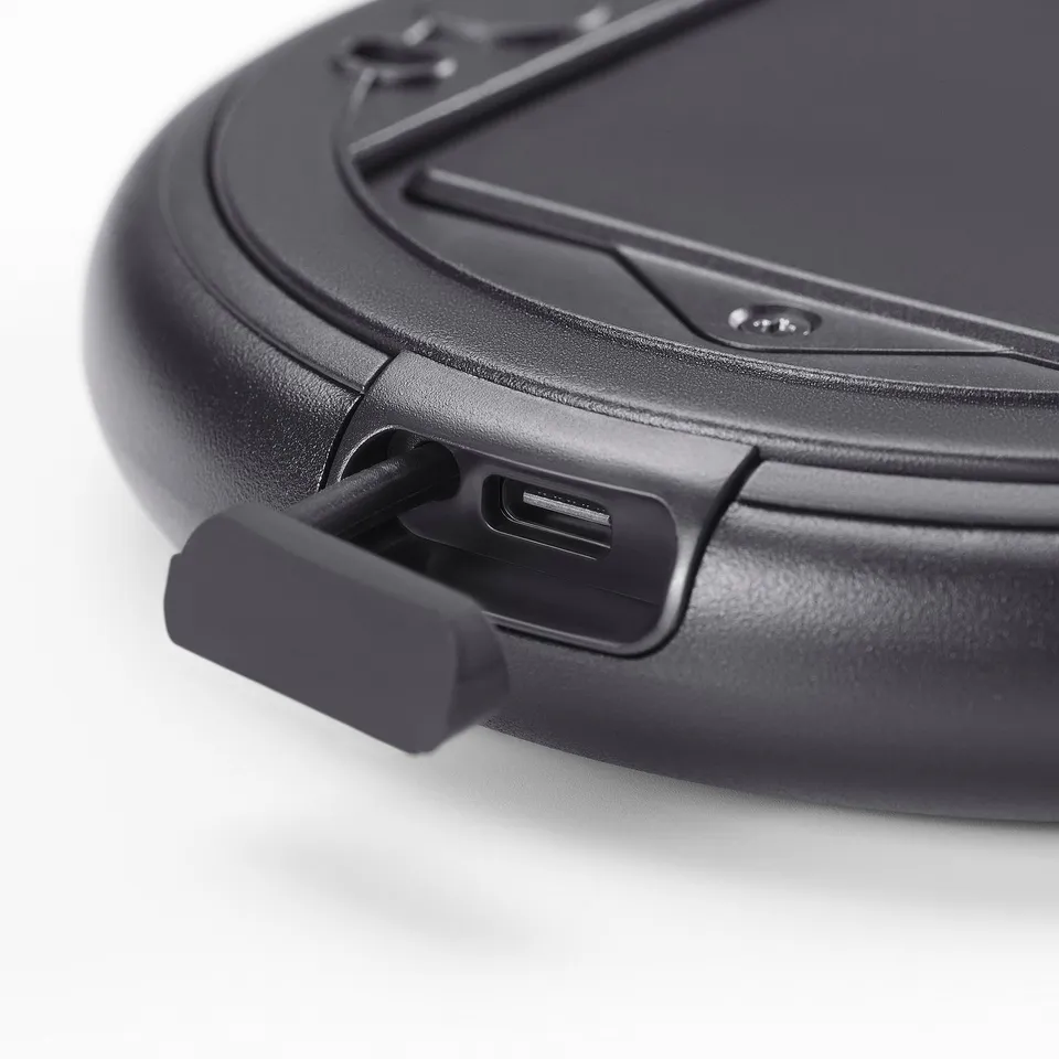 Black handheld magnifying mirror with usb-c port, smooth edges, and secure latch.