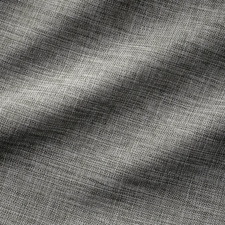Close-up of a smooth, textured fabric cushion cover, showcasing its sturdy, woven design and subtle sheen.