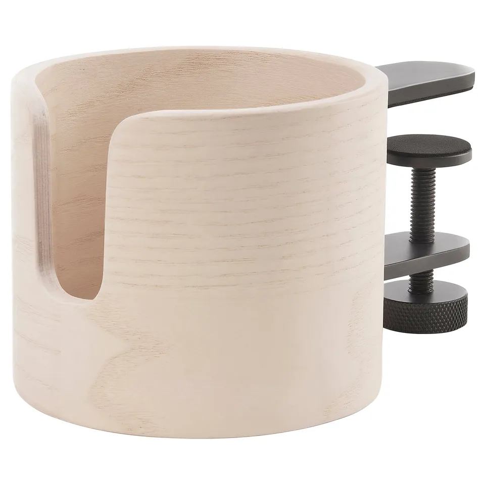 The LÅNESPELARE mug holder is light brown, made of wood and metal, with a clamp design for easy desk attachment.
