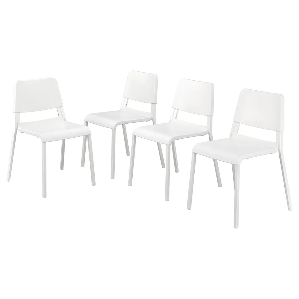 Four white plastic chairs with steel legs. Simple, modern design.
