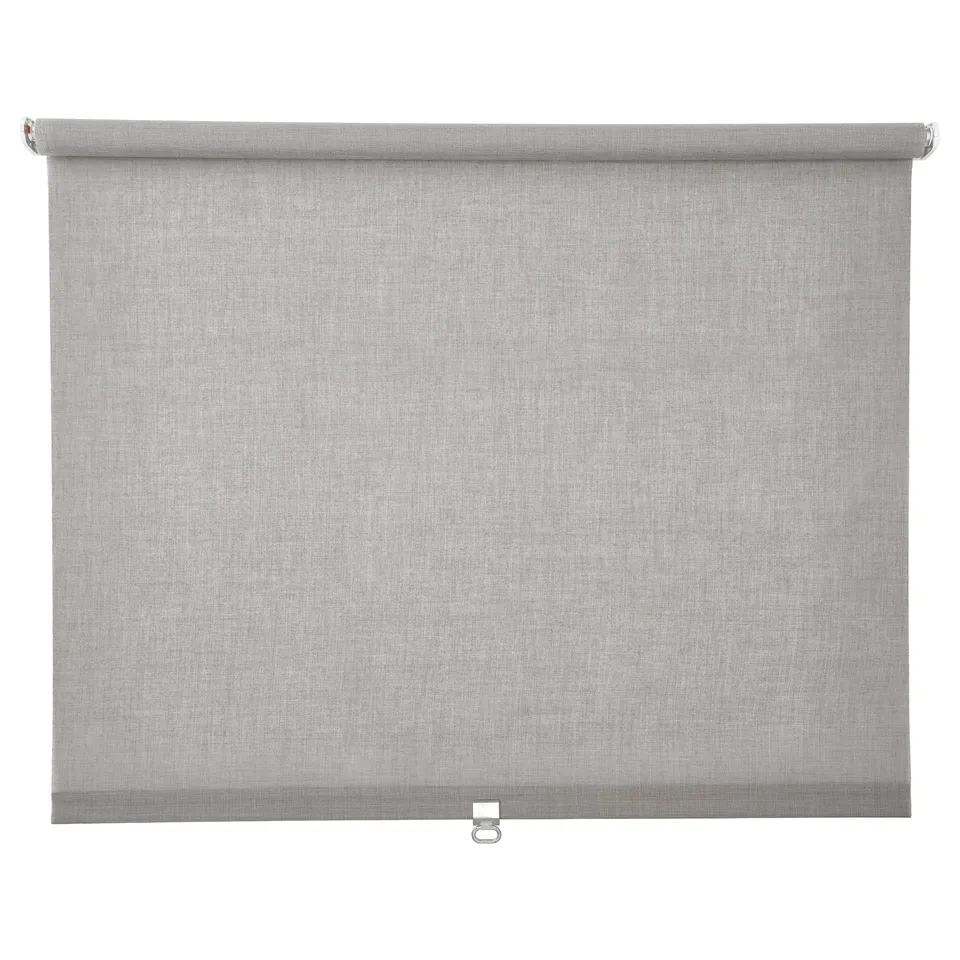 A light grey LÅNGDANS roller blind with a simple, modern design. It fits tall windows and has a cordless, safe mechanism.