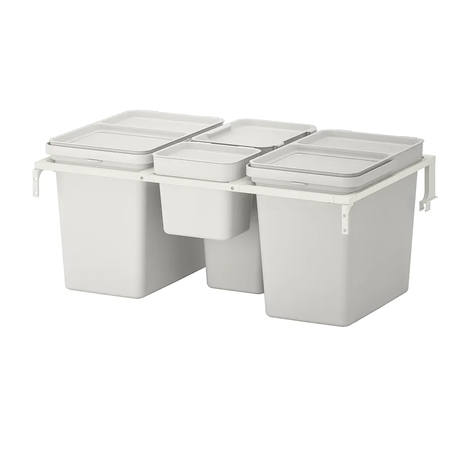 Three white HÅLLBAR waste sorting bins with lids, mounted and aligned, designed for organised recycling in the kitchen.