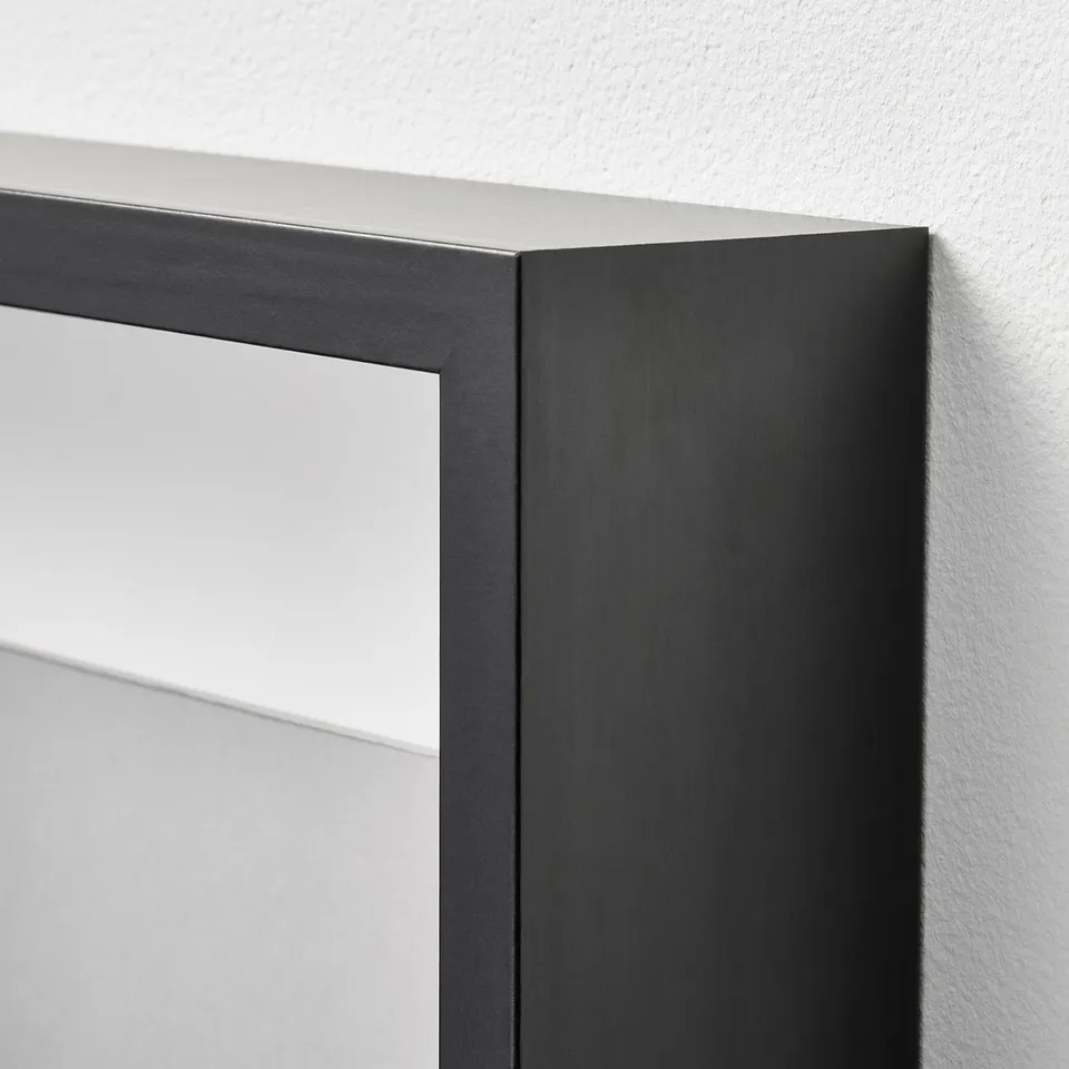 A close-up of a modern wall frames corner, highlighting clean lines and sturdy construction.
