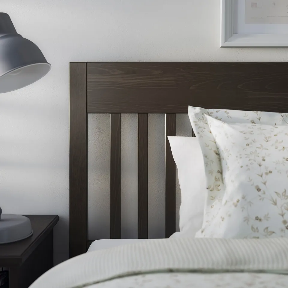 IDANÄS bed with headboard, adjustable side, storage, lamp, patterned pillow