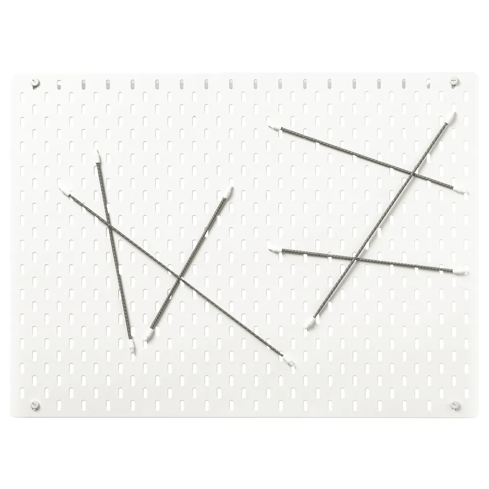 SKÅDIS white pegboard with grey hooks arranged in star shapes.