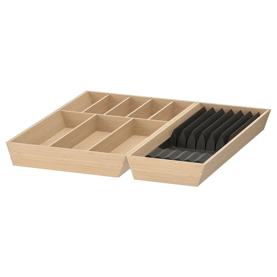 Bamboo drawer organiser with knife rack and compartments for kitchen cutlery.