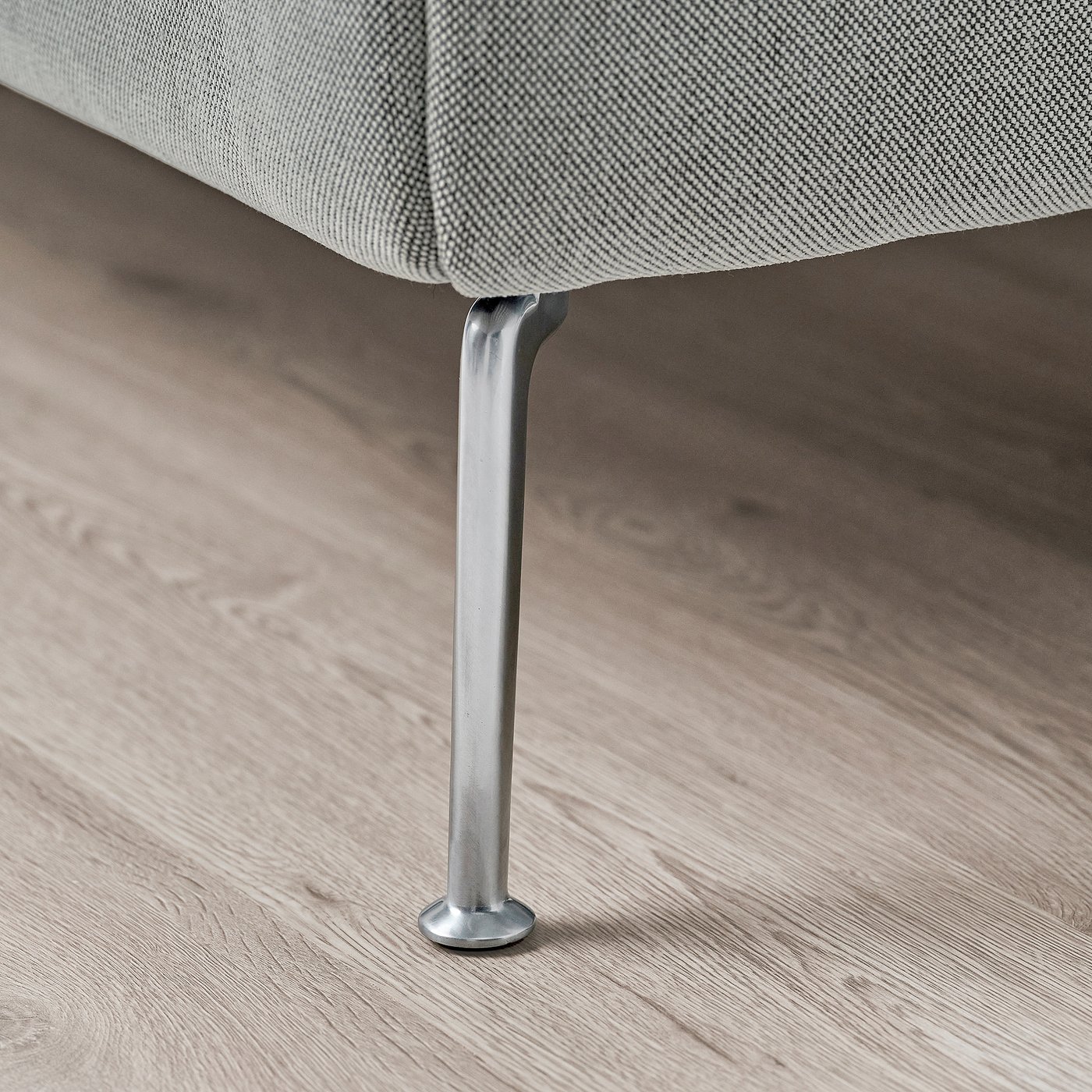 A close-up of a stylish bed leg, sleek and sturdy, showing quality craftsmanship.