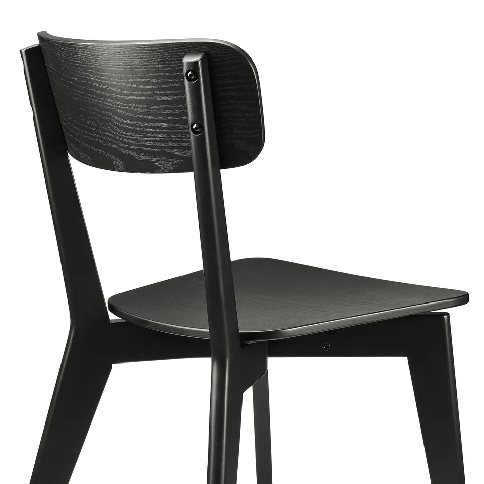 Black wood chair with rounded back, sturdy frame, and smooth seat. Modern design for comfort and support.