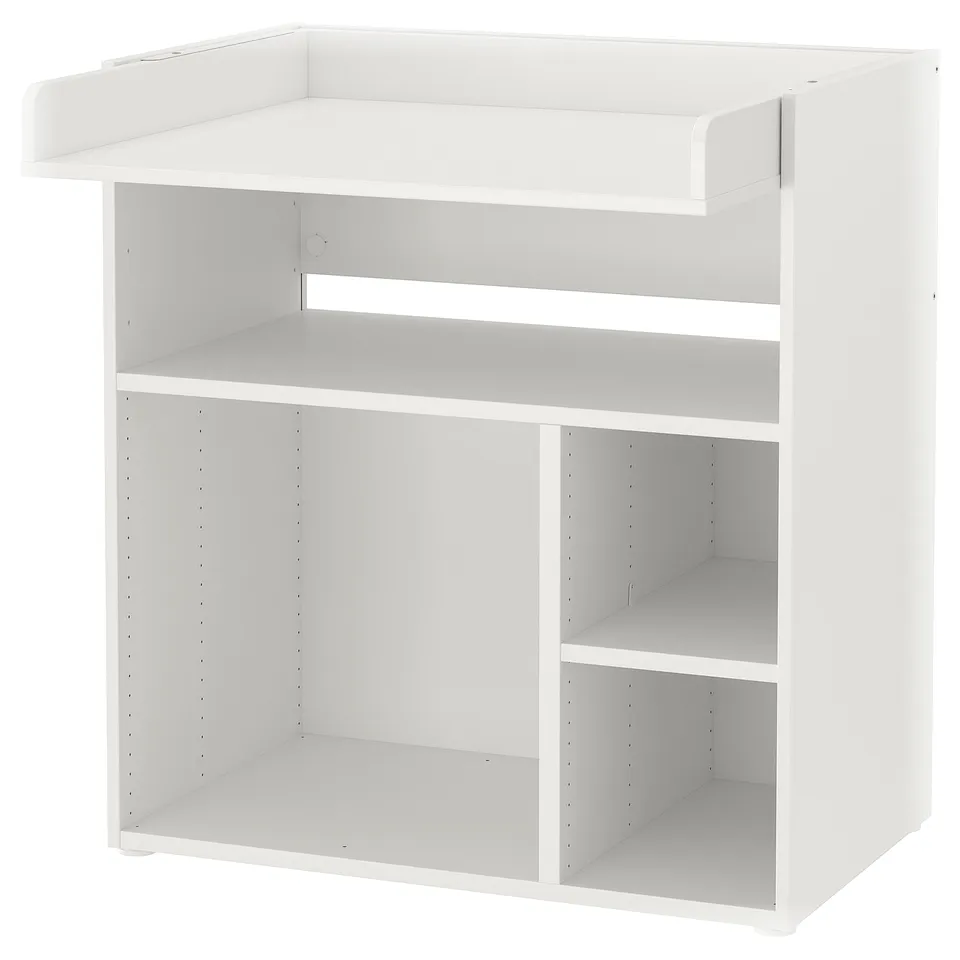 White SMÅSTAD changing table; rectangular, three open shelves, safe design for baby.