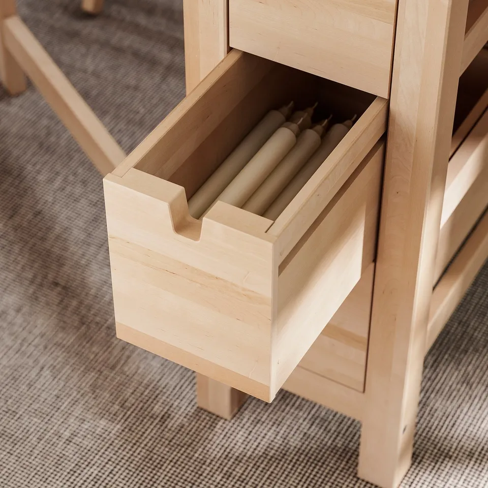Light wood drawer unit, part of NORDEN gateleg table. Holds cylinders, adjusts table size.