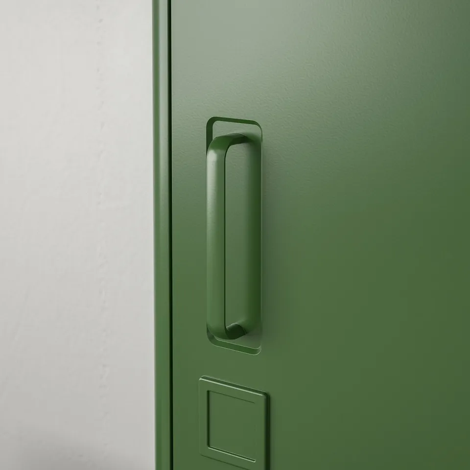 Green door with sleek handle, smooth finish, and built-in magnet.