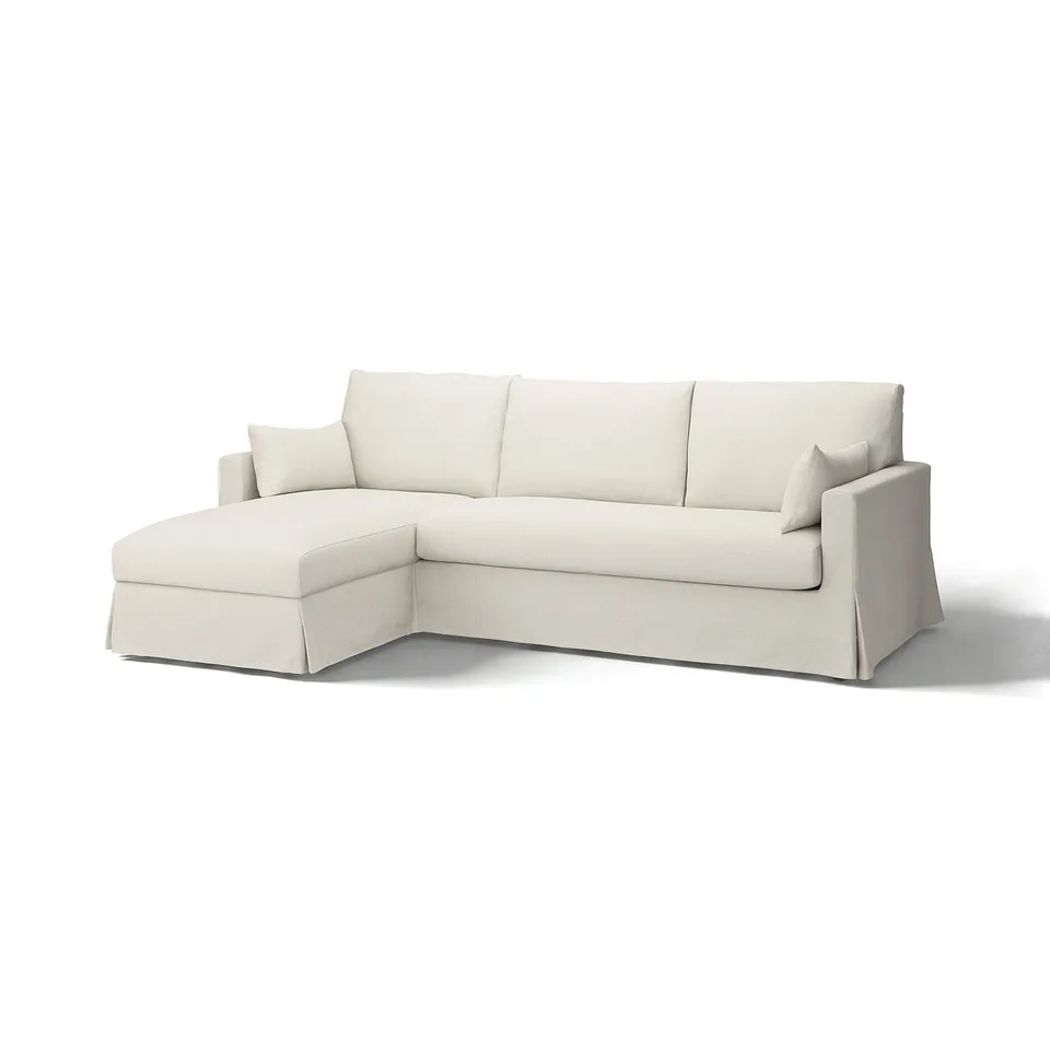 HYLTARP sofa, cream-colored, l-shaped, with plush cushions.