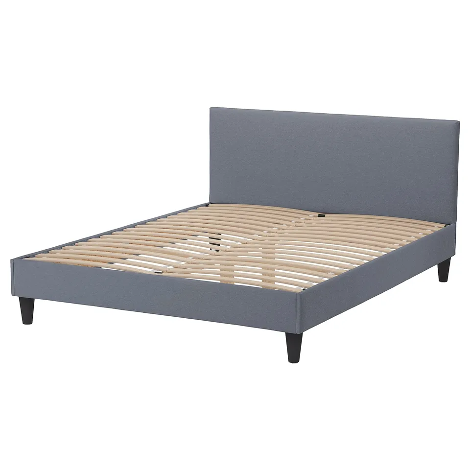 Grey fabric bed frame with wooden slats and dark legs.