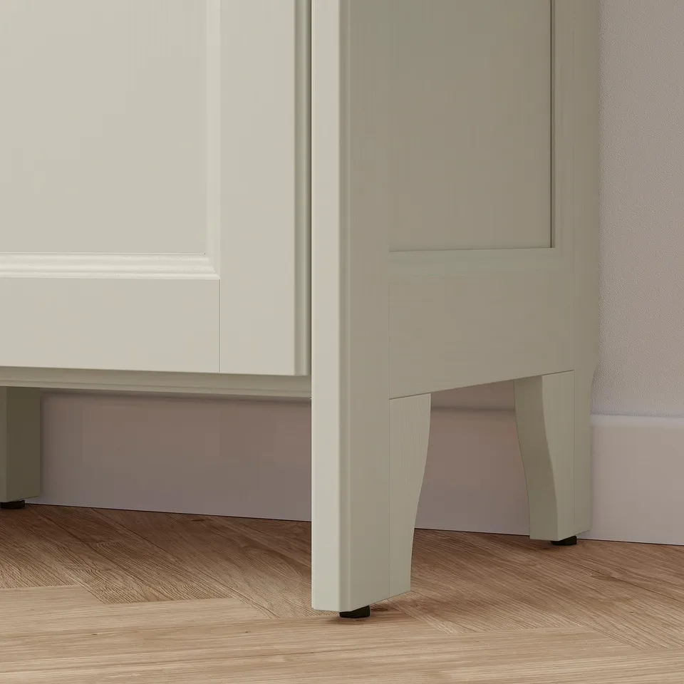 Modern storage with sleek, light panels and cut-outs, showcasing quality design.