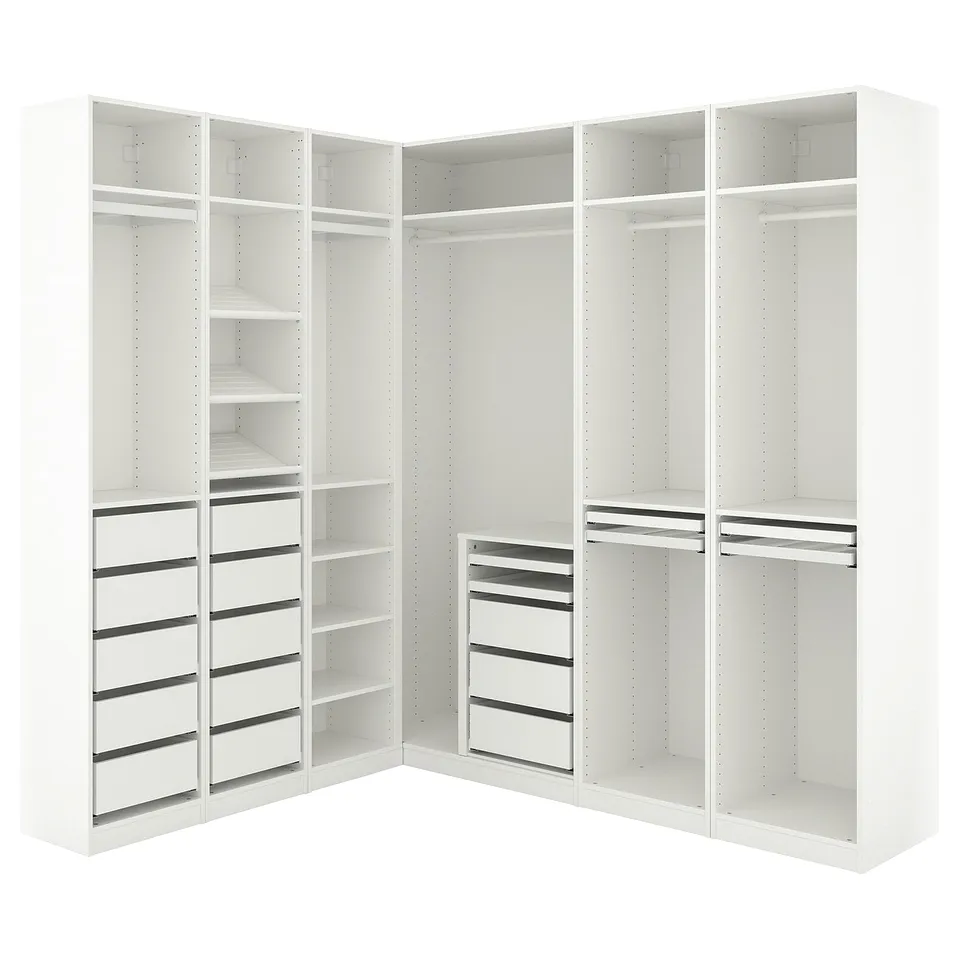 The PAX wardrobe is a white, l-shaped closet system with multiple shelves and drawers for efficient storage.