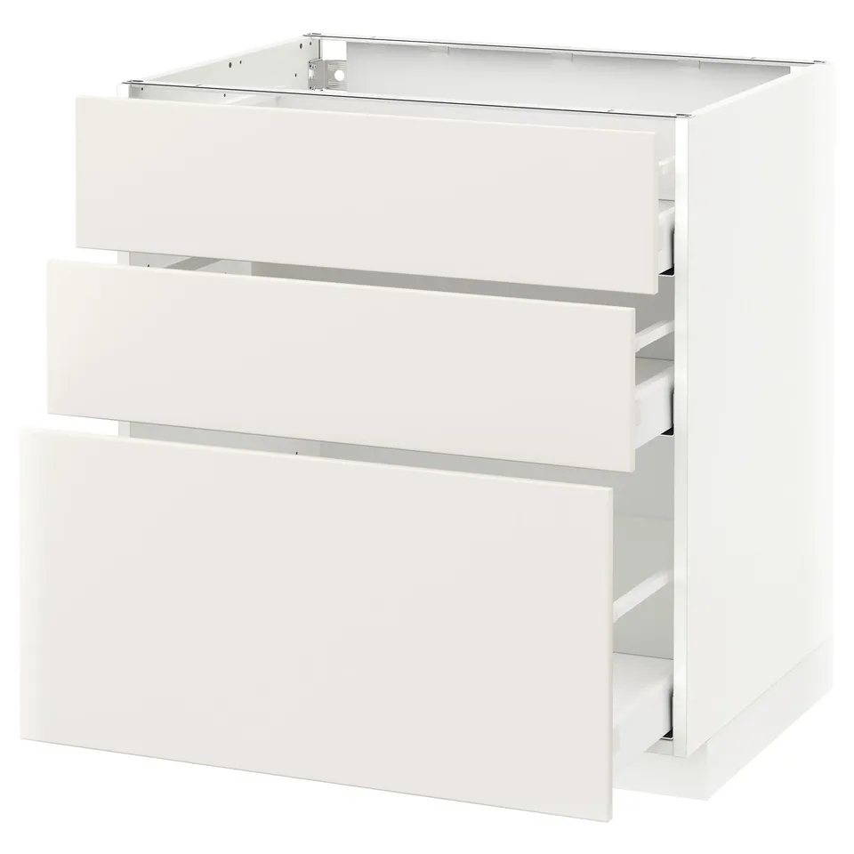 White METOD cabinet with three drawers, sleek modern design.
