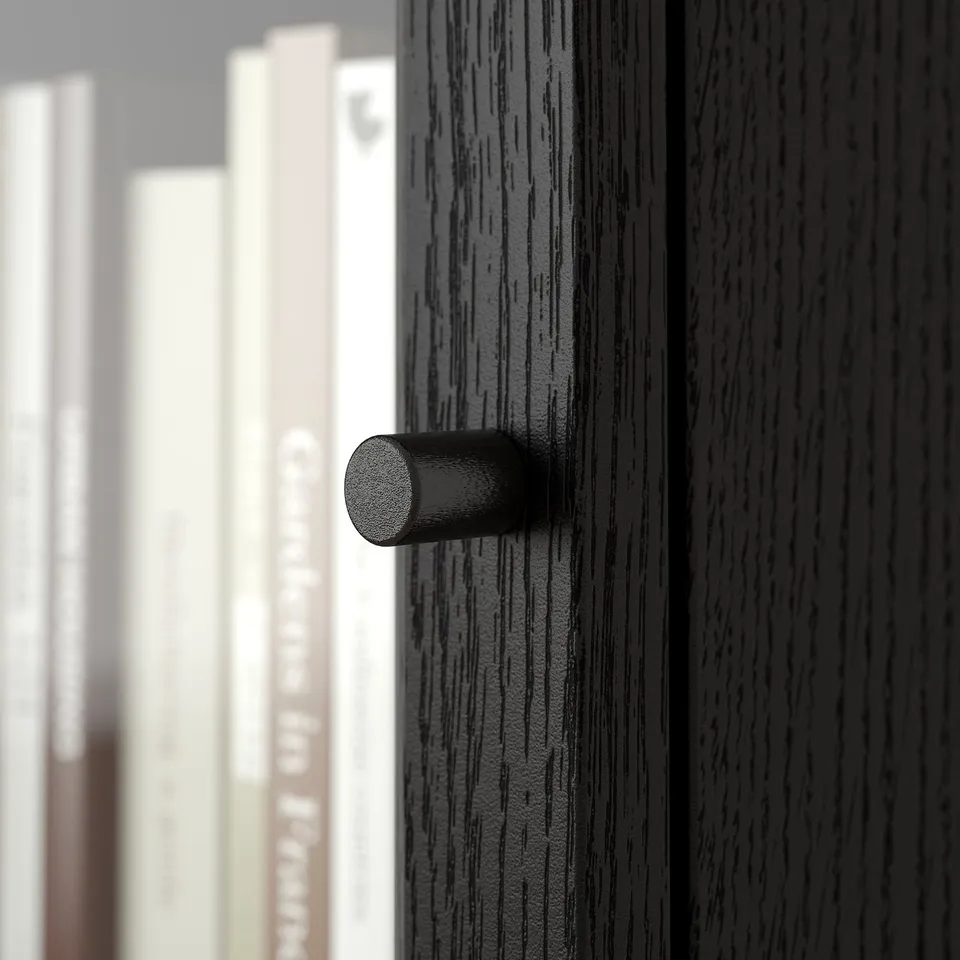 Dark wooden drawer with sleek black handle, showcasing quality craftsmanship and modern design.