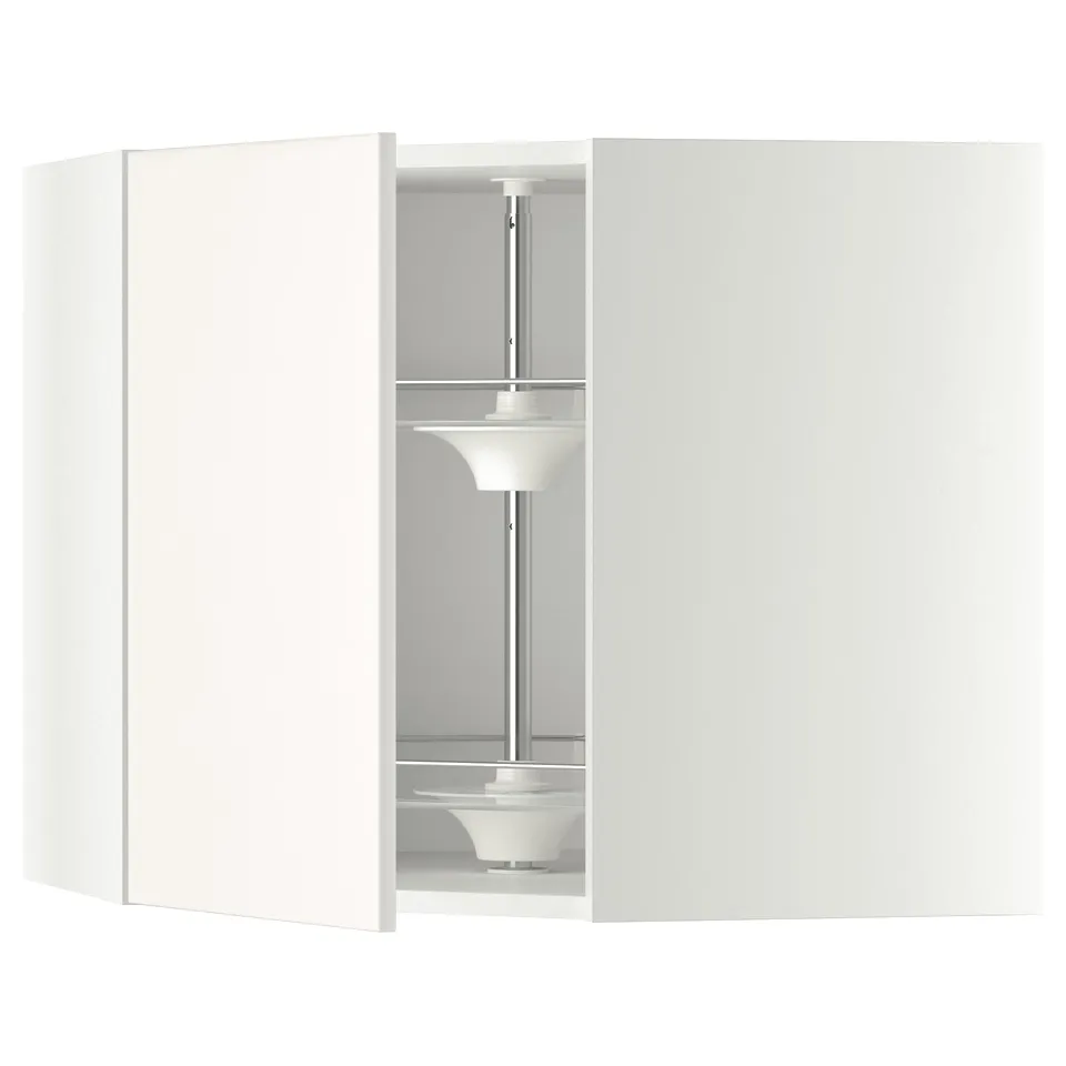 A white METOD kitchen unit with a curved design. It includes a carousel shelves system for efficient storage.