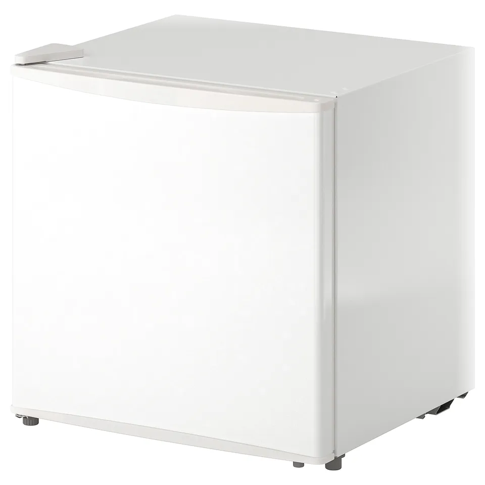Small white fridge, compact, sleek design for small kitchens, fits drinks and snacks.