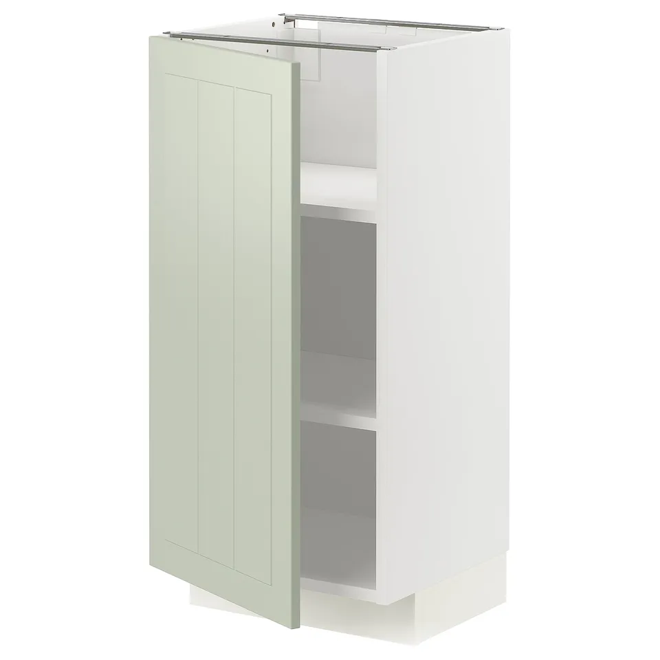 Light green kitchen cabinet, modern design, with a single door and two shelves.