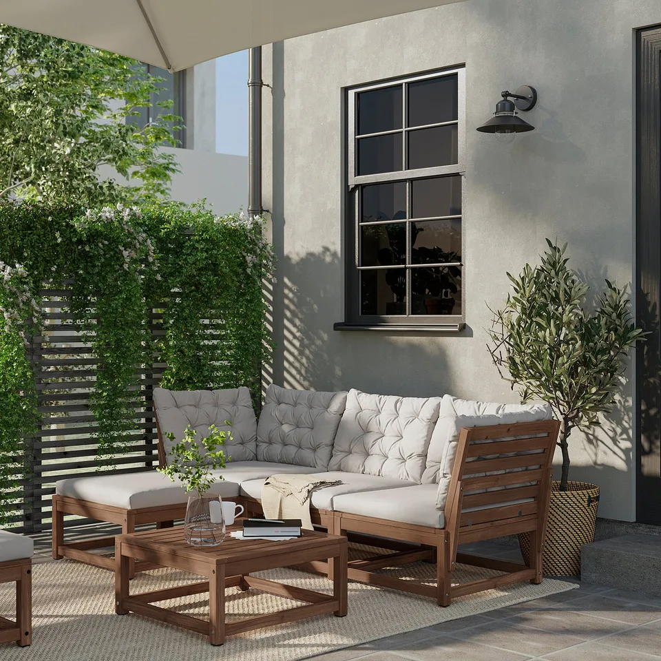 NÄMMARÖ 3-seat sofa, outdoor with footstool/light brown stained Kuddarna light grey-beige, 210 cm