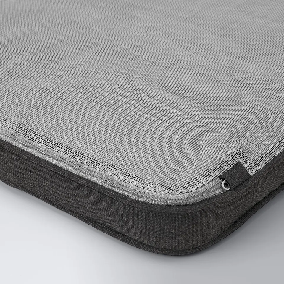 Mesh zippered case, durable stitching, grey texture.