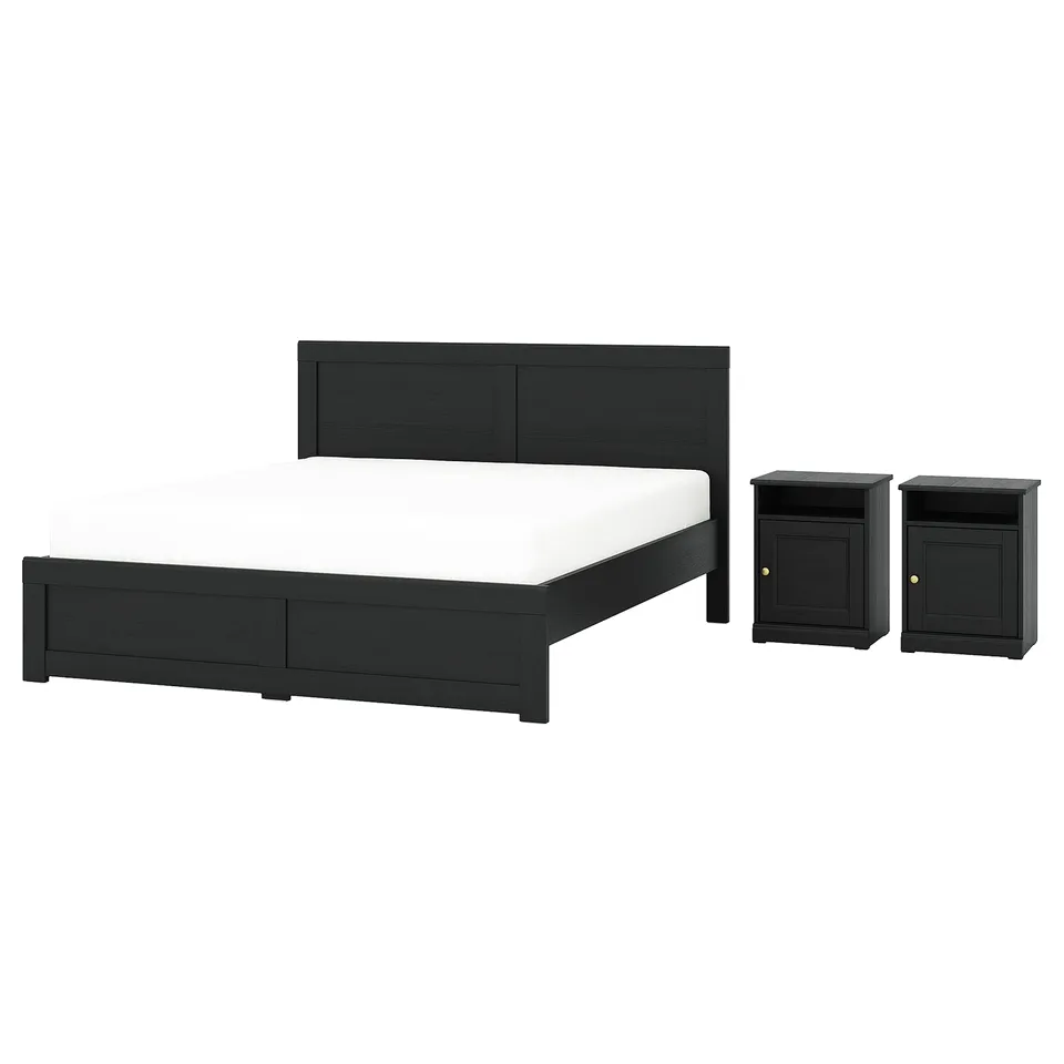 Black wooden bed with matching nightstands, sleek modern design.