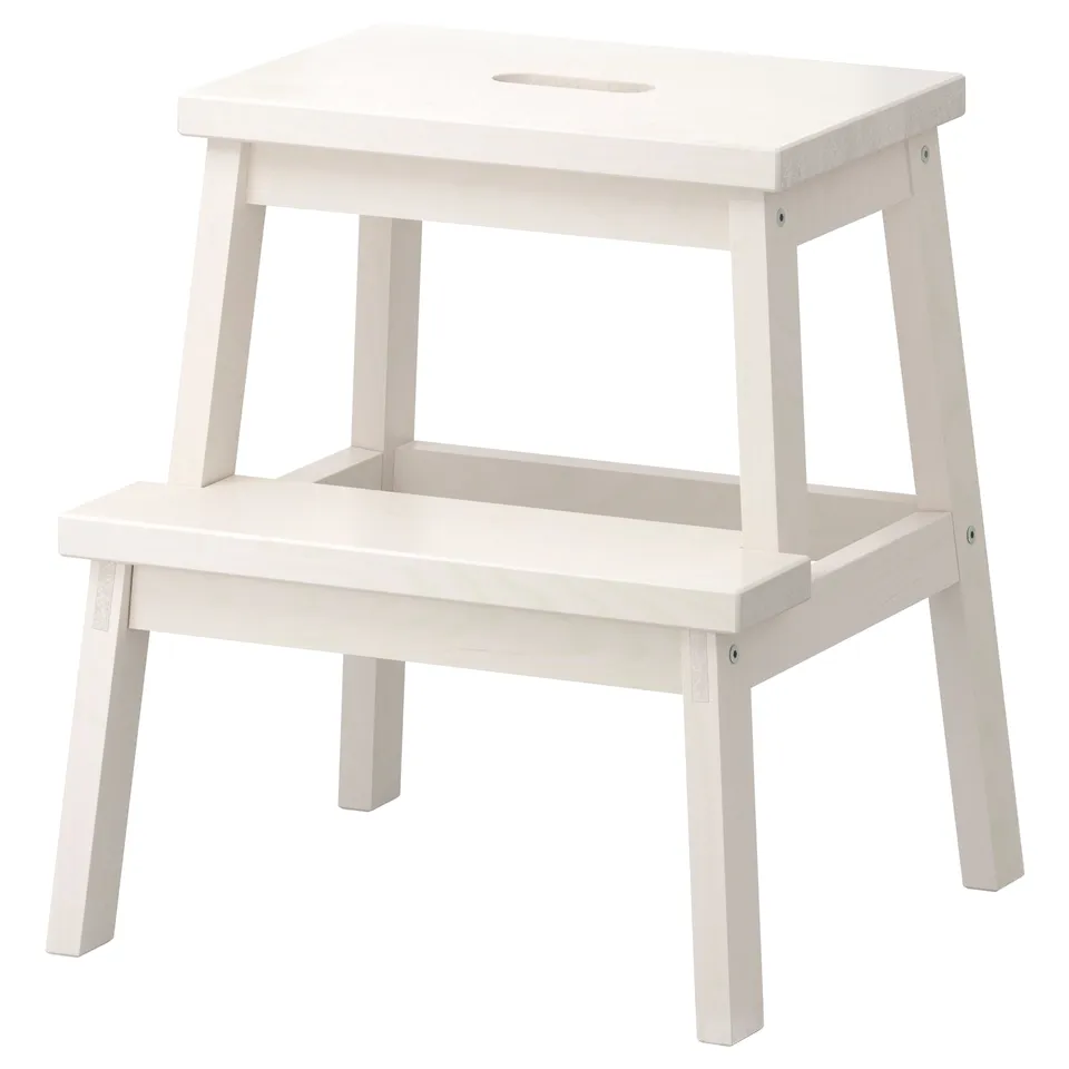A white BEKVÄM step stool with two steps, featuring a simple and sturdy wooden design.