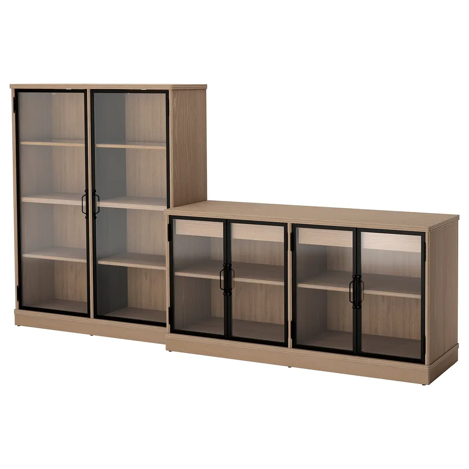 A set of light brown wooden cabinets with glass doors. Include beech veneer, metal handles, and sliding glass doors.