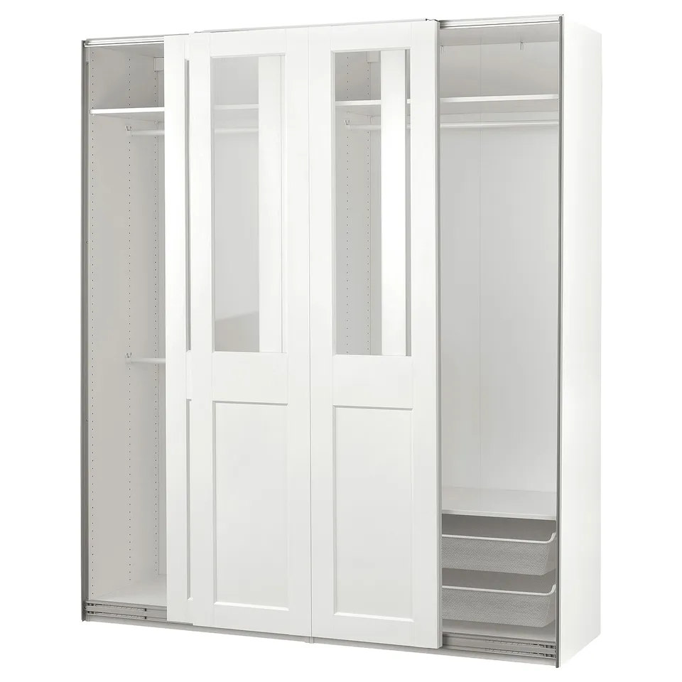 A white PAX wardrobe with glass doors, featuring mesh drawers and hanging space. It offers a sleek, modern design with ample storage.