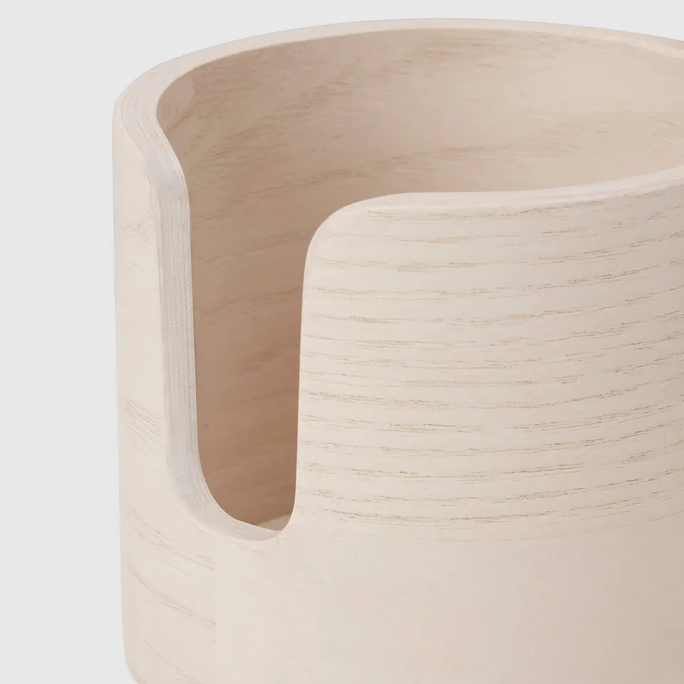 Light wooden mug holder, smooth finish, curved design, front opening.
