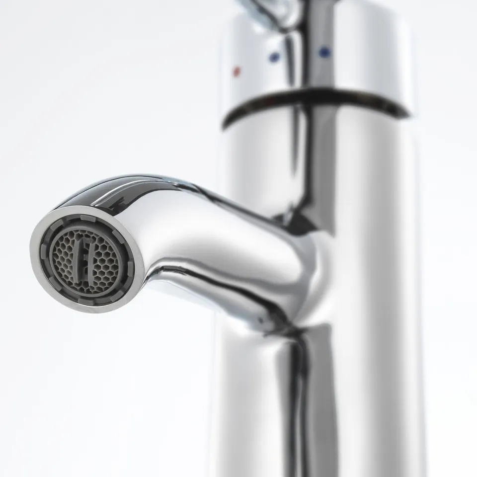Chrome tap with aerator, sleek design, high-quality finish.