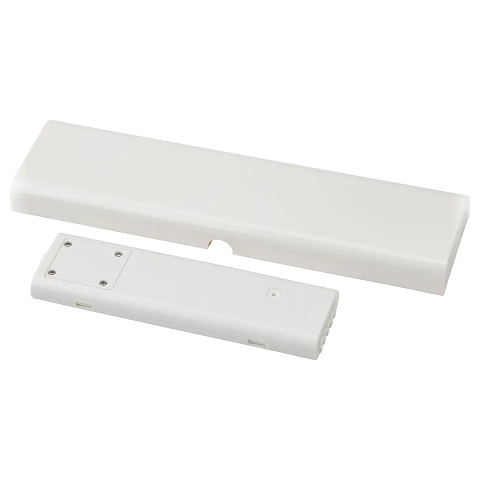 A white SILVERGLANS smart lighting driver, made of polycarbonate plastic, with a rectangular shape, and a hook for installation.